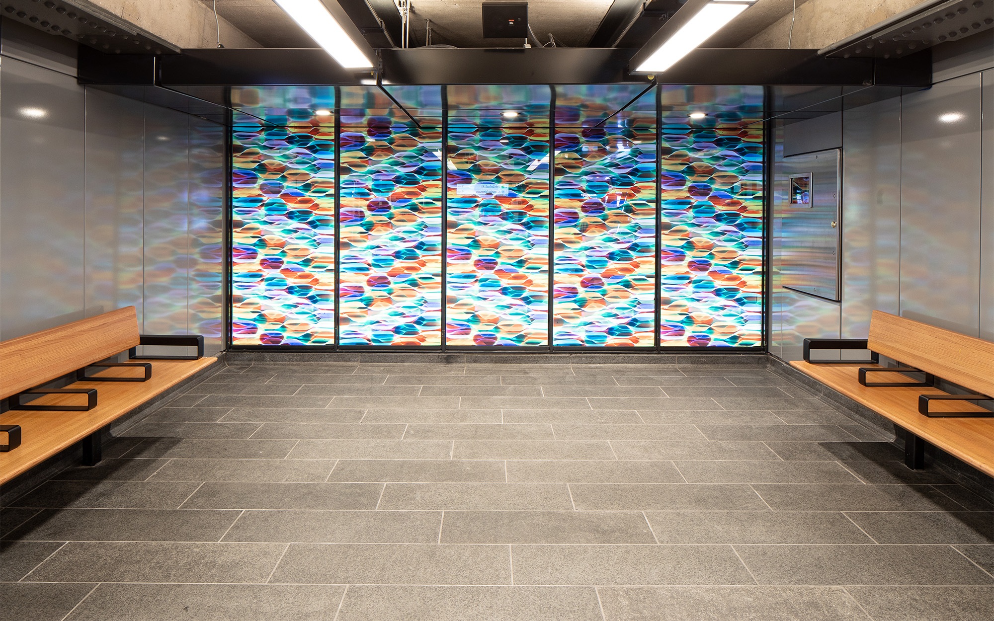 Subway station waiting area in Astoria, Queens.