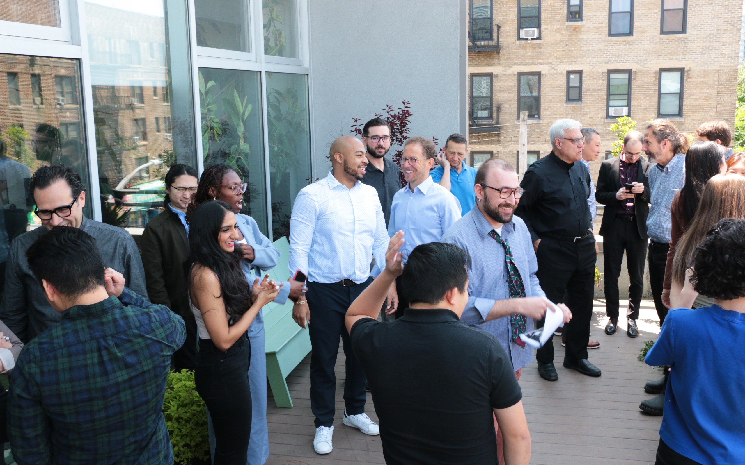 studio members socializing on the terrace