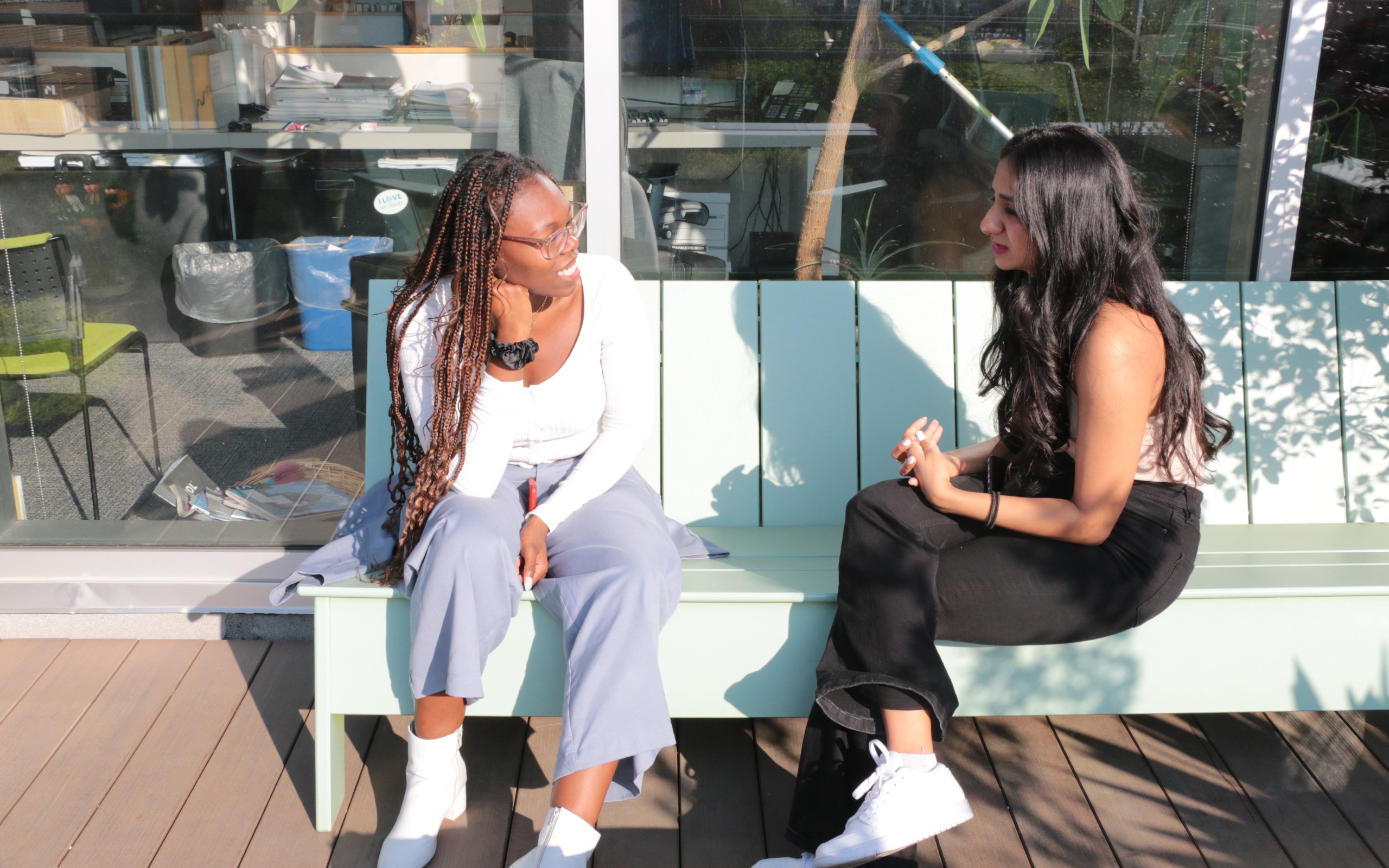 studio members socializing on the terrace