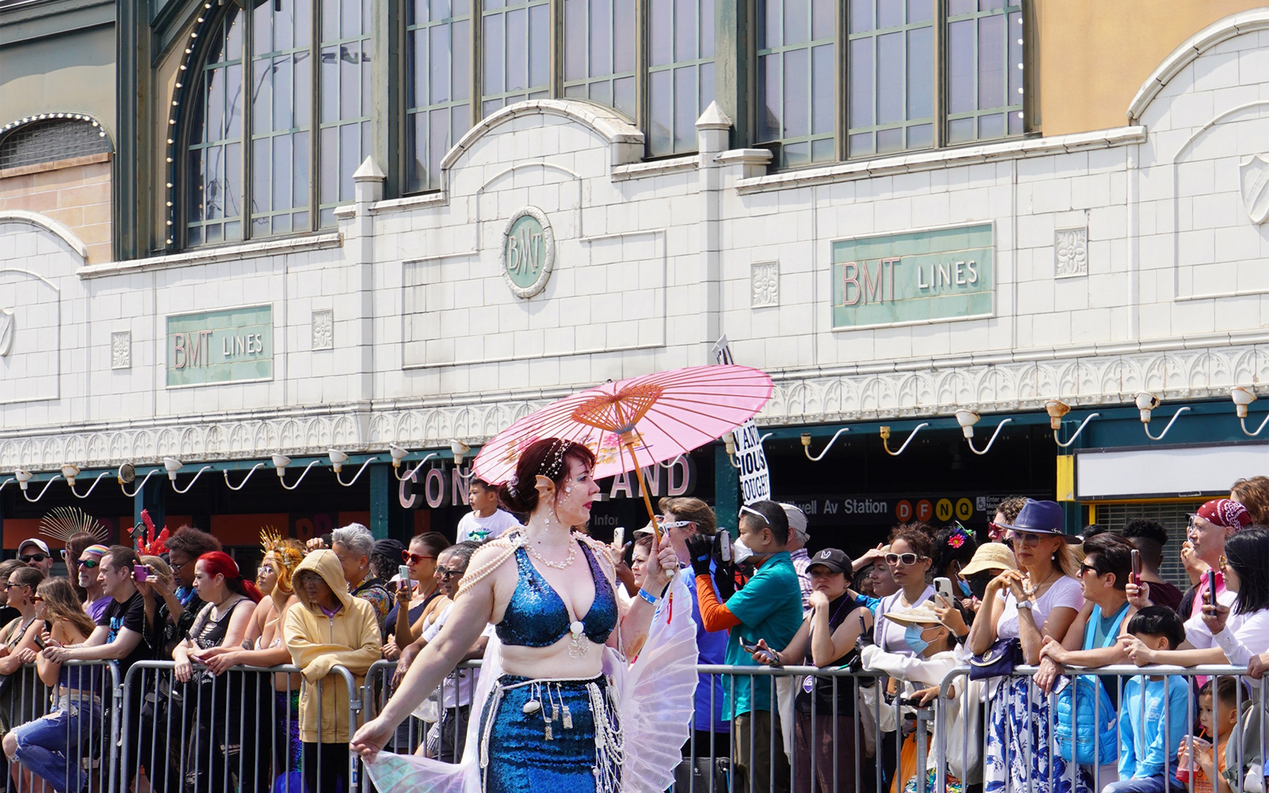 41st Annual Mermaid Parade procession in front of Stillwell Avenue Station