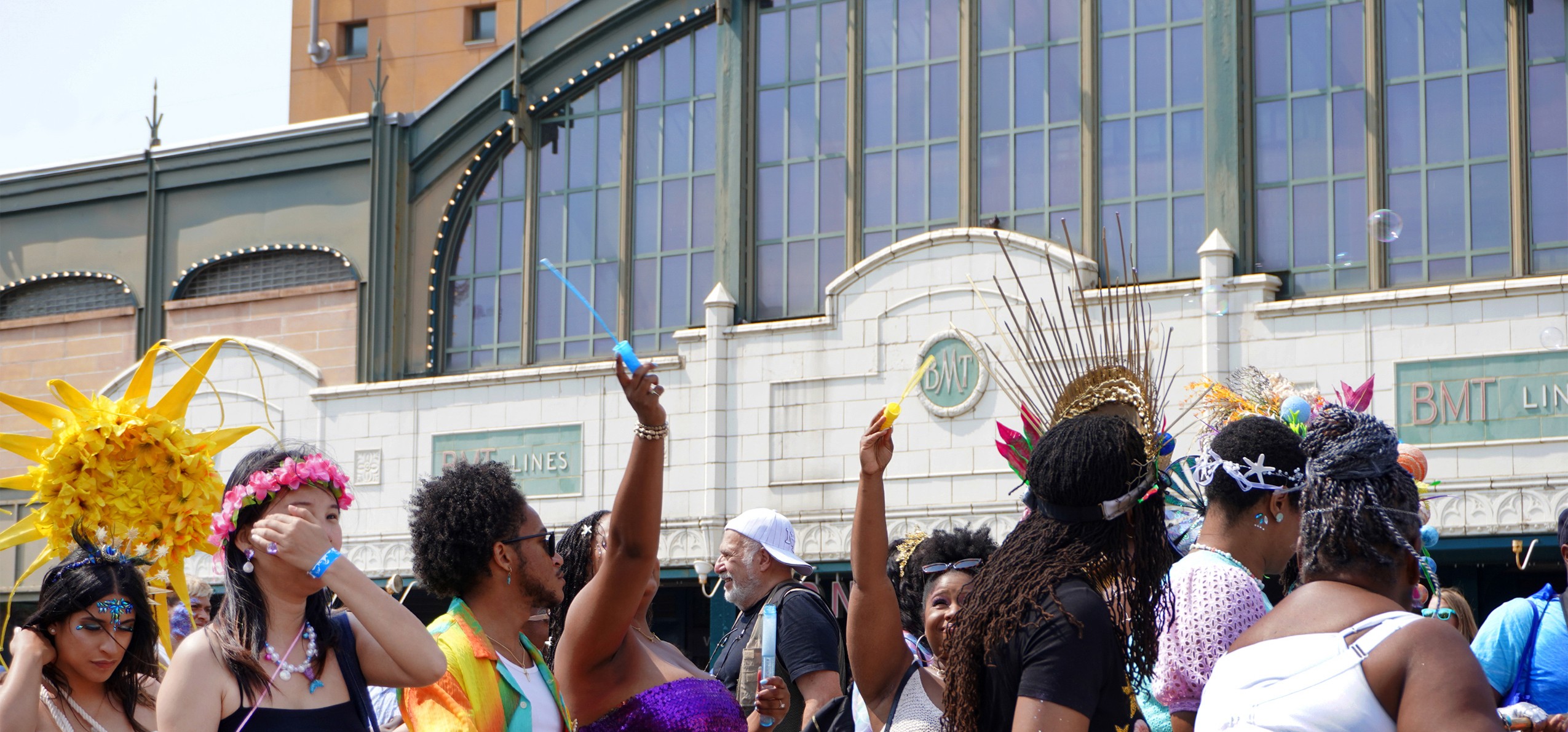 41st Annual Mermaid Parade procession in front of Stillwell Avenue Station