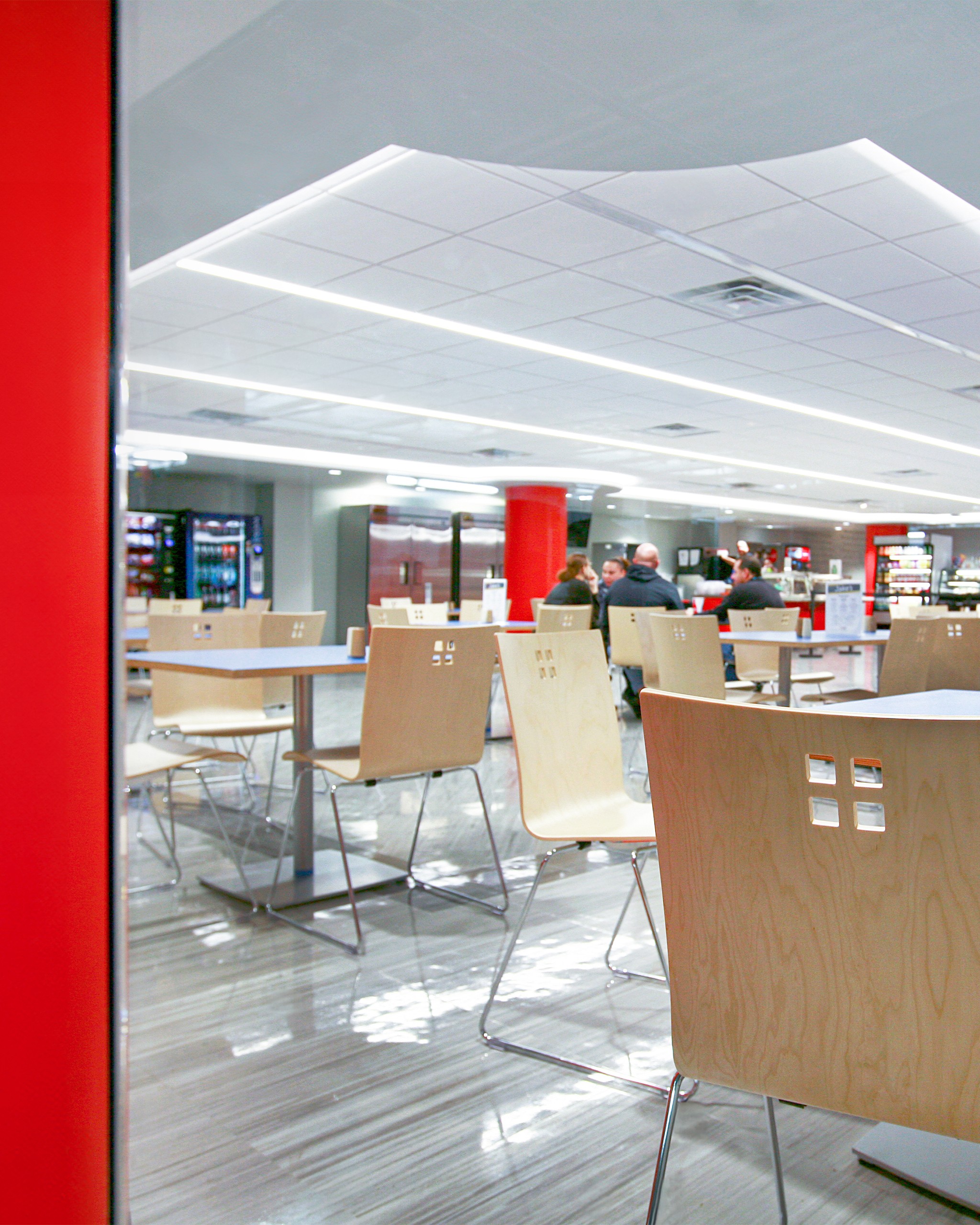 Jacob K. Javits Convention Center staff cafeteria. Custom designed ceiling, modern lighting and updated furniture provide a welcome respite to all staff members.