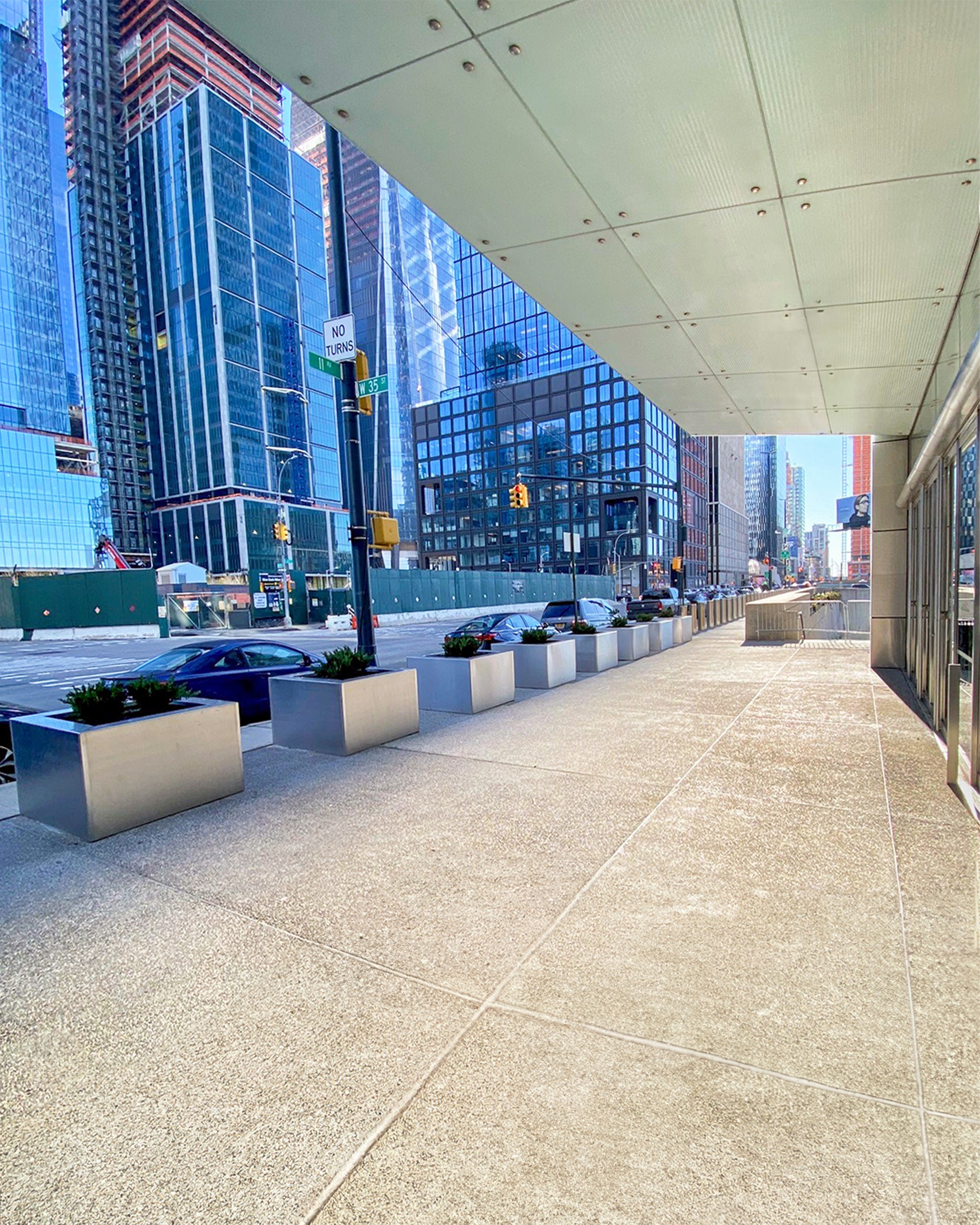 Jacob K. Javits Convention Center custom designed crash-rated planters along 11th Avenue.